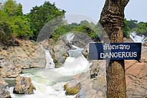 Dangerous sign at Somphamit waterfall, Mekong