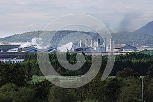 Dangerous smoke over chimney of factory. Enviroment pollution