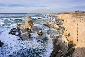 Dangerous surf crushing on the rugged cliffs of Montana de Oro State Park, San Luis Obispo county, California