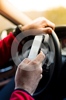 Dangerous texting while driving fast in car