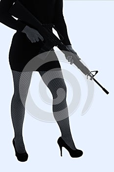 Dangerous woman in black with assault rifle