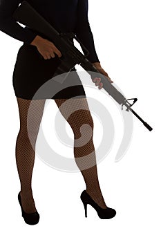 Dangerous woman in black with assault rifle
