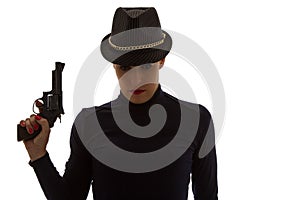 Dangerous woman in black with big handgun