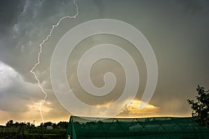 Dangerously close day time lightning bolt strikes from a severe thunderstorm