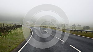 Dangers of driving in fog - road turn