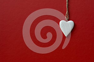 Dangling white heart minimal style