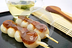 Dango Japanese dessert, served with tea.