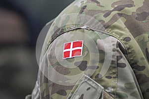 Danish army uniform with the Danish flag on the shoulder. Danish military, selective focus