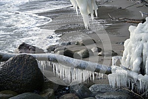 Danish coastline winter landscape with ice on the beach..