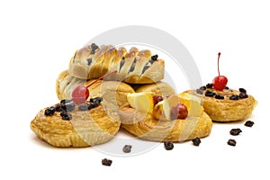 Danish pastry with fruits isolated on white background