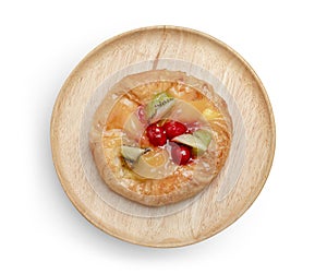 danish pastry with fruits in wooden dish isolated on white background ,include clipping path