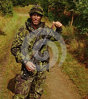 Danish Scout Unit Member & x28;Special Forces& x29; doing training. Yuri Arcurs own snapshot photos from his military days