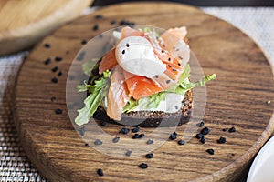 Danish smorrebrod on wooden board. Restaurant food photo