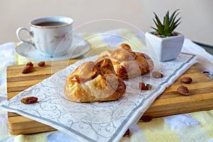 Danish sweet pastry with tea in background