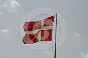Dannebrog or in othe word danish flag flys over Copenhagen photo