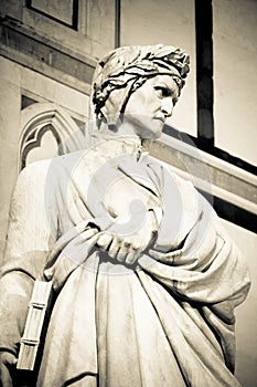 Dante Alighieri statue in Santa Croce square in Florence in black and white