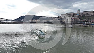 Danube River Ferry Cruises in Budapest, Boat Tours. Hungary. Buda Palace in Background