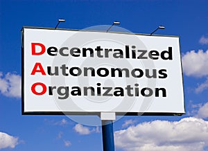 DAO decentralized autonomous organization symbol. Concept words DAO decentralized autonomous organization onbillboard on a