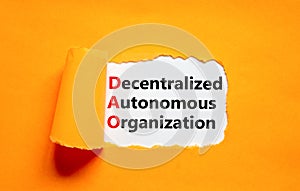 DAO decentralized autonomous organization symbol. Concept words DAO decentralized autonomous organization on white paper on a