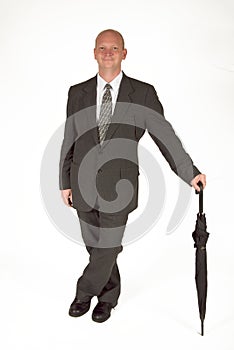 Dapper Businessman With Umbrella 01 photo