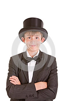 Dapper confident young boy in a top hat