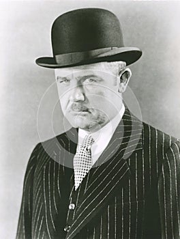 Dapper man in bowler hat photo