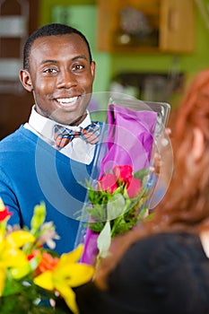 Dapper Man in Flower Shop Buys Roses