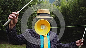 Dapper man and his yellow diabolo