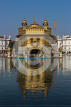 Darbar Sahib Golden Temple Amritsar with its reflection sarovar Nishan Sahib Punjab Tourism