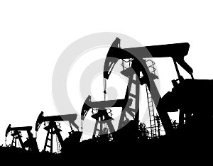 Darck silhoutte of oil rig and pumps during.