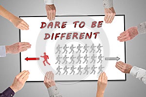 Dare to be different concept on a whiteboard