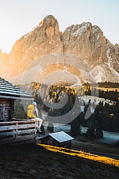 Daring climber conquering the jagged mountainous heights of the Dolomites, part of the Alps in Italy