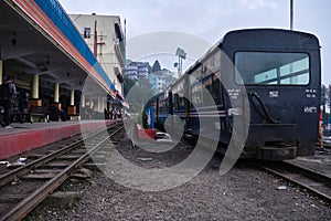 DARJEELING, INDIAN -June 22, The toy train of Darjeeling Himalayan Railway runs on the track in Darjeeling, India. Darjeeling