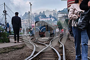 DARJEELING, INDIAN -June 22, The toy train of Darjeeling Himalayan Railway runs on the track in Darjeeling, India. Darjeeling