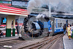 DARJEELING, INDIAN -June 22, The toy train of Darjeeling Himalayan Railway runs on the track in Darjeeling, India. Darjeeling