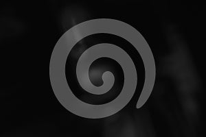 Dark abstract scene with soft reflective shapes