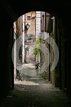 Dark alley in Recanati, Marche Italy