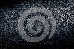 Dark asphalt texture background. clean grain asphalt texture close-up