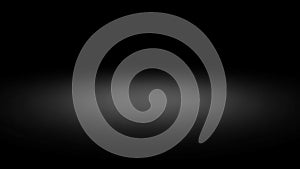 Dark background with a soft, diffused circular light gradient abstract