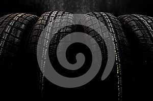 Dark background with winter tires