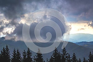 Dark big cloud on top of mountain, thunderstorm in mountains_