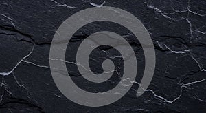 Dark black slate rock background texture