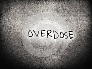 on the dark black and white color background art the word overdose