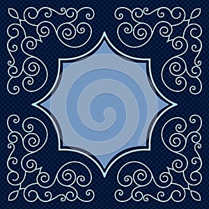 Dark blue card with swirls ornament.