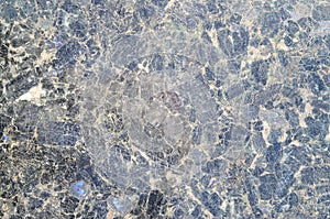 Dark blue close up granite texture pattern surface abstract background. Black stone, pattern for wallpape