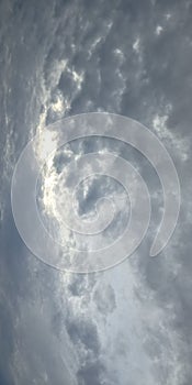 Dark blue cloud with white light sky background and light