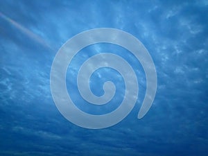 Dark blue cloud with white light sky background and light