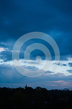 dark blue cloudy sky background