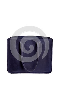 Dark blue female leather bag with reptile skin details isolated on white