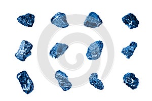 Dark blue gem stones set white background isolated closeup, raw sapphire gemstones collection, group quartz rocks, rough amethyst